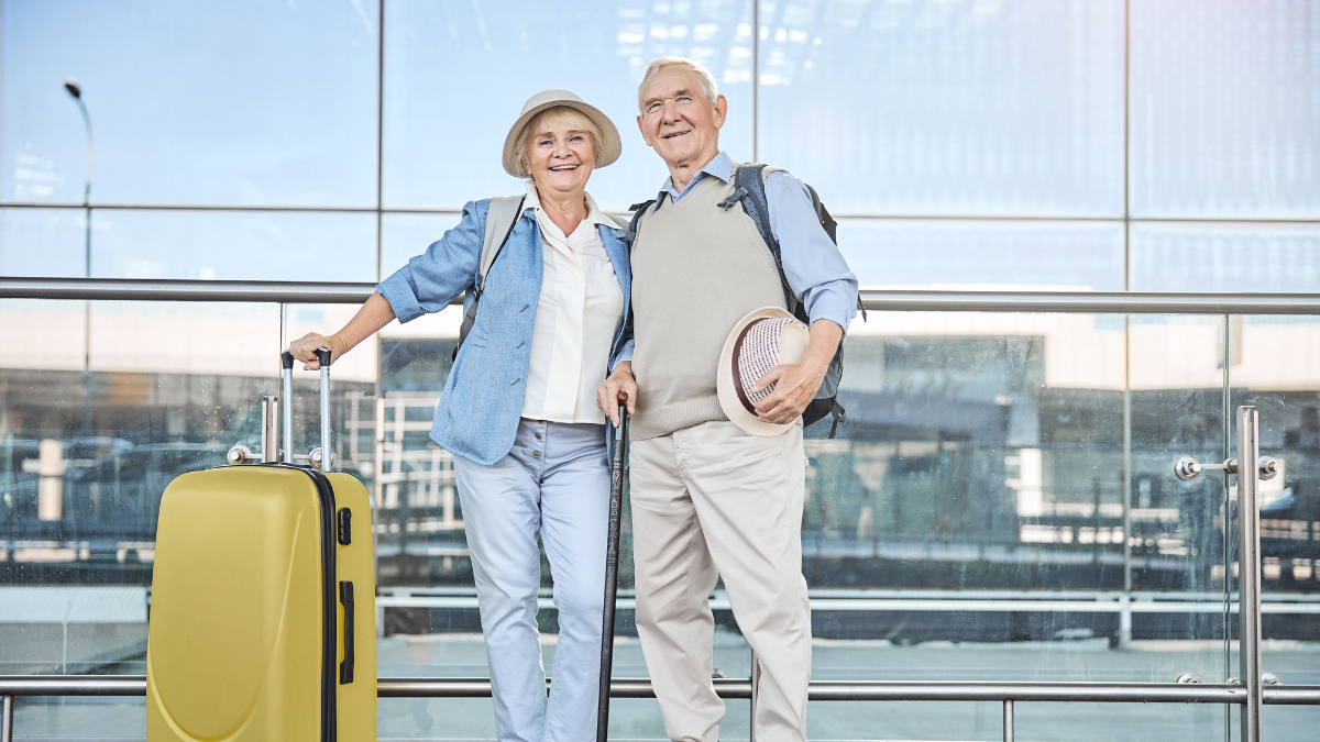 elderly couple flying