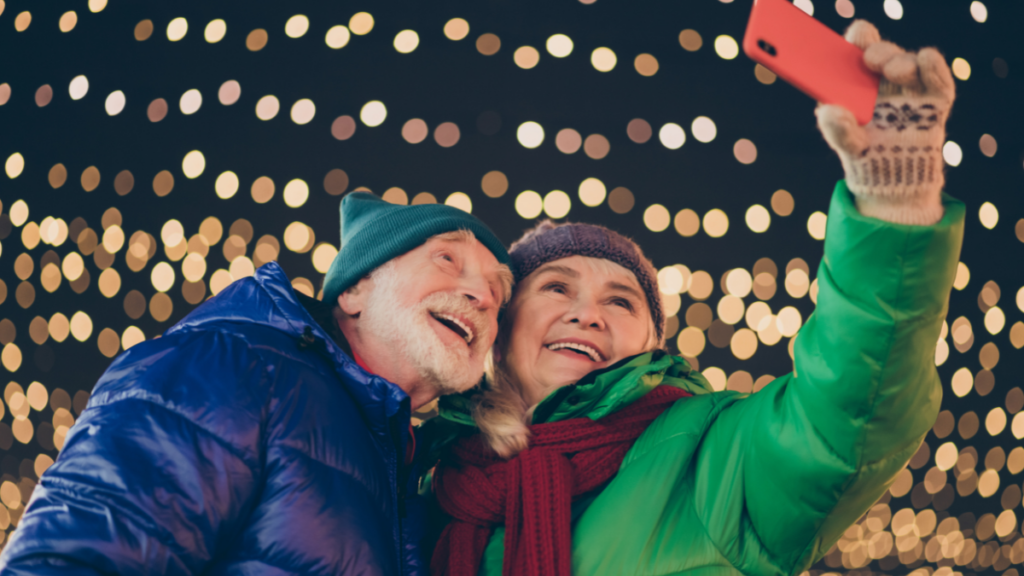 elderly couple taking selfie