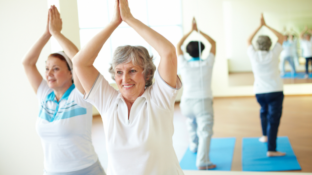 elderly person doing yoga