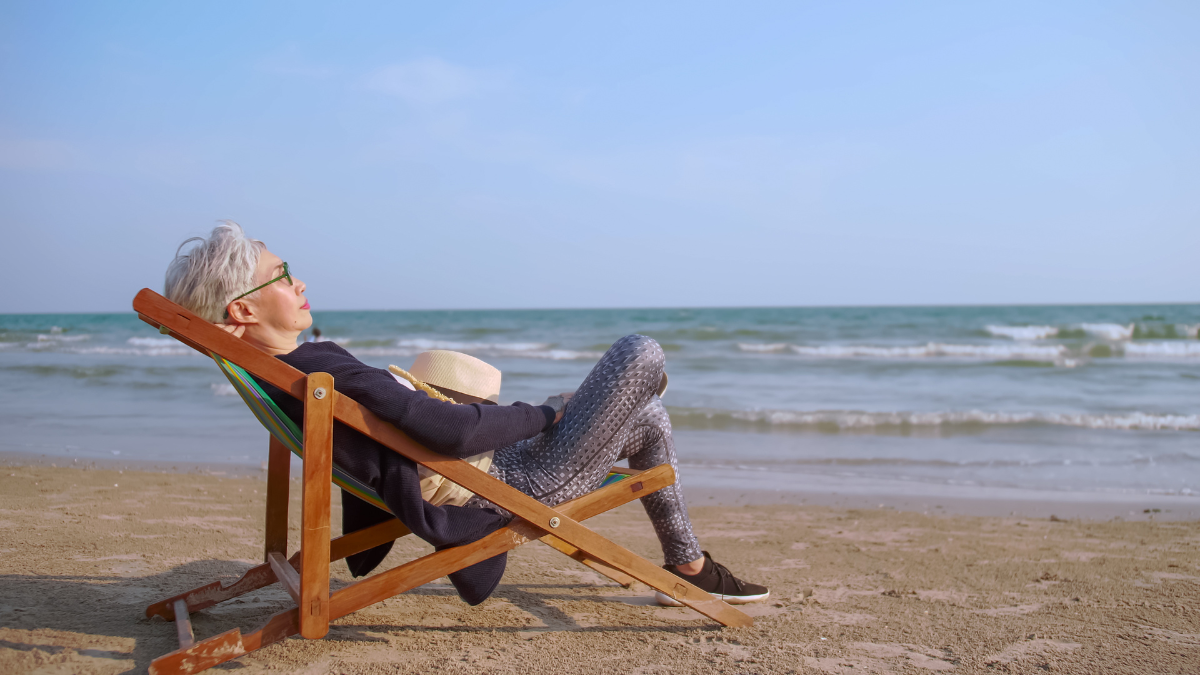 elderly person on beach