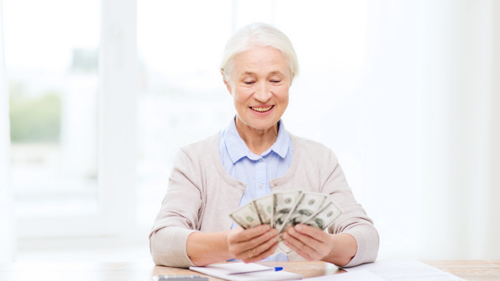 elderly woman with money