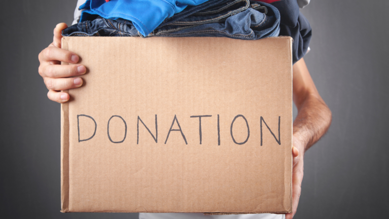 man holding donation box