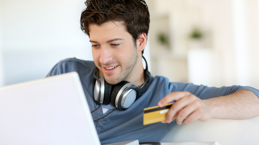 man paying with credit card