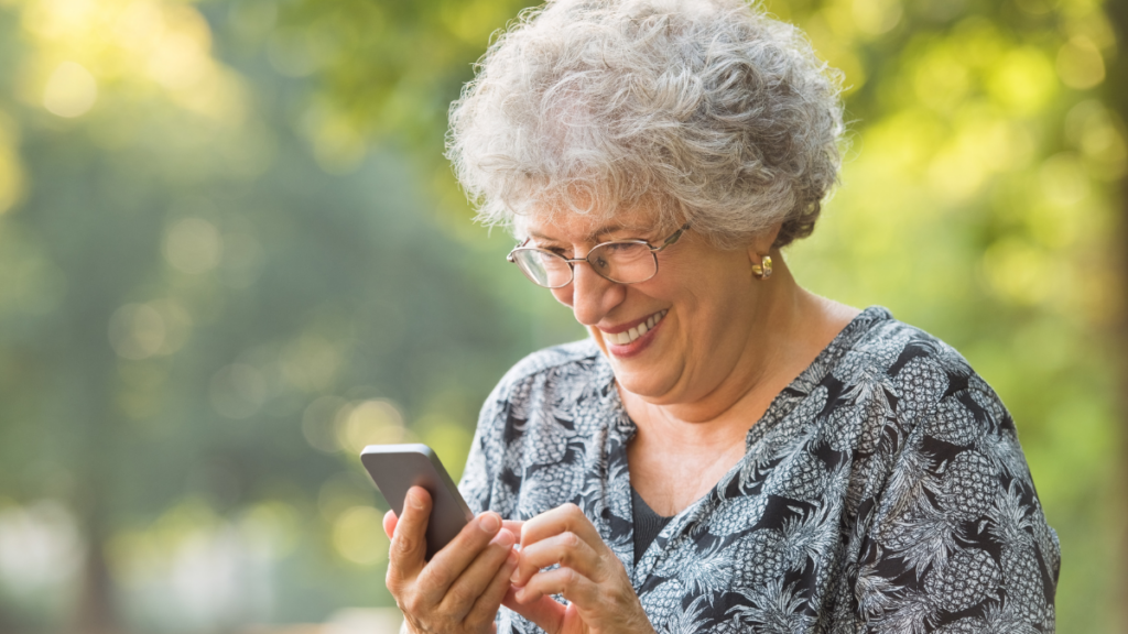 older woman looking at phone