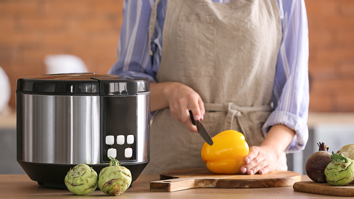 woman using crockpot