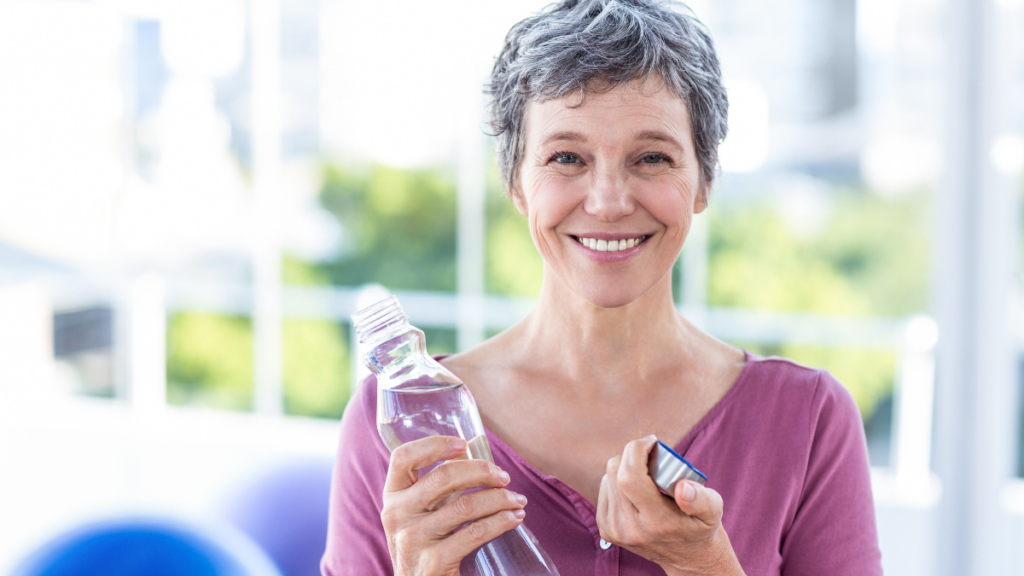 woman with reusable water bottle