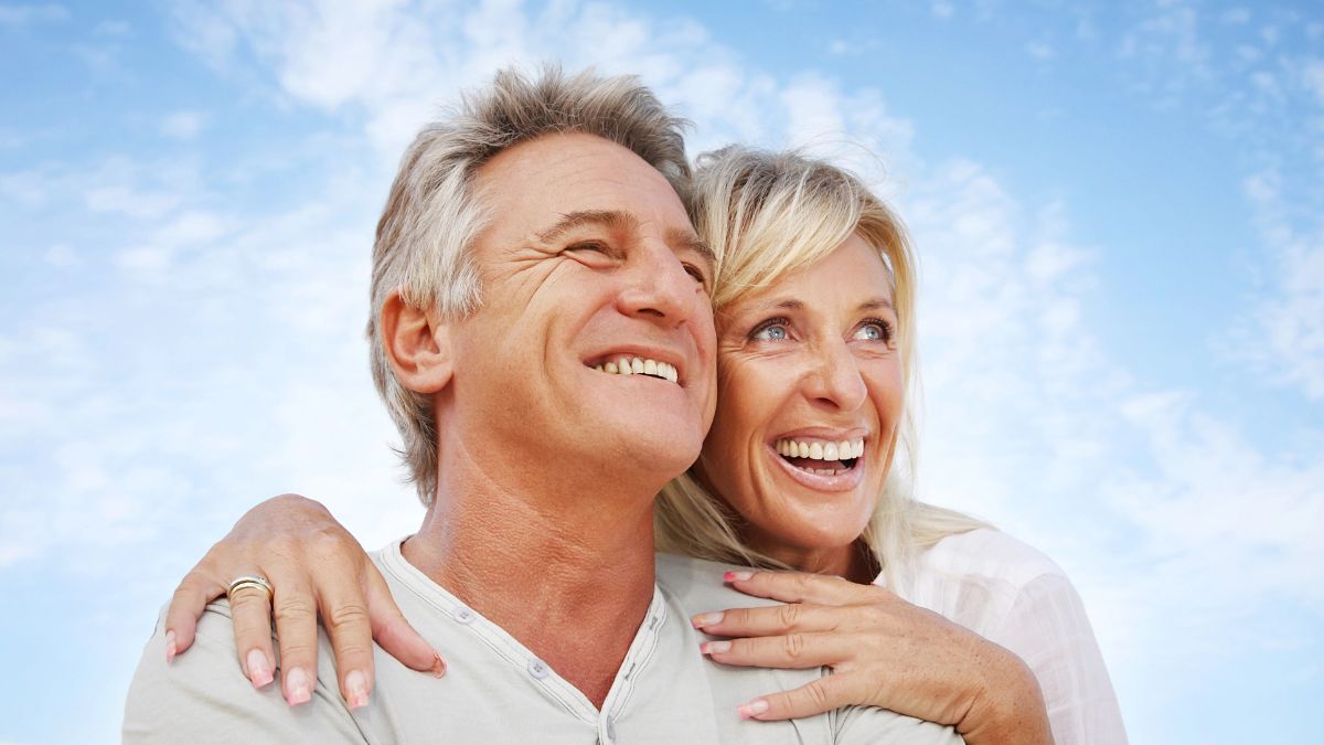 Happy older couple outside