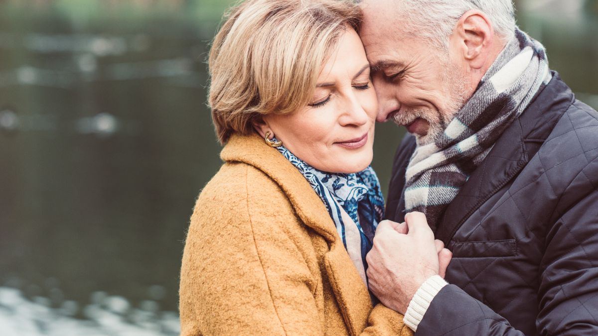 Middle aged couple hugging