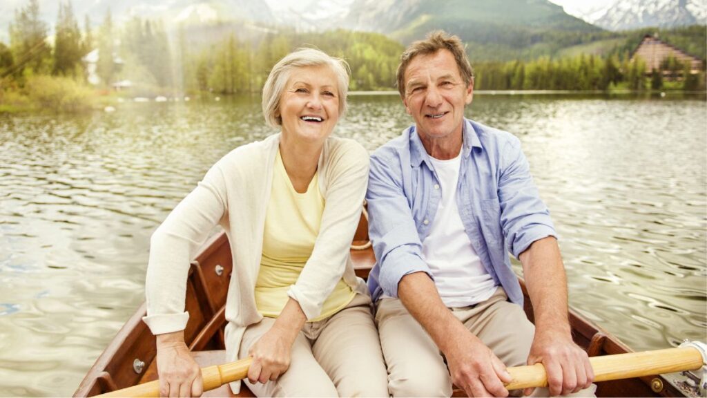 Older couple on a canoe on the river