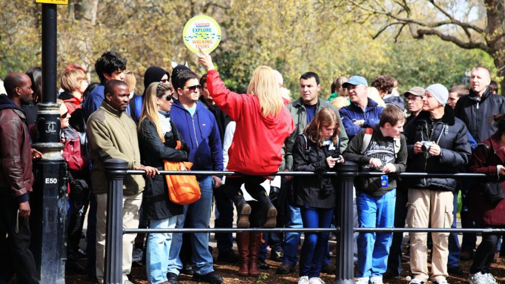 Tour guide talking to a group of people