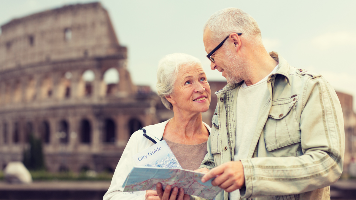 retired couple with map