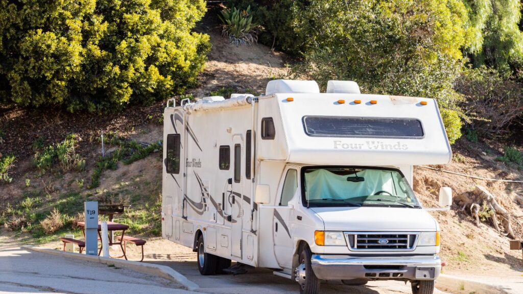 white rv at campsite