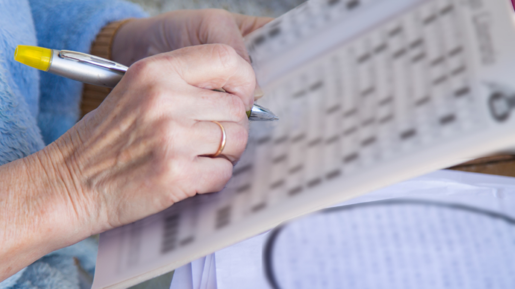 woman doing crossword