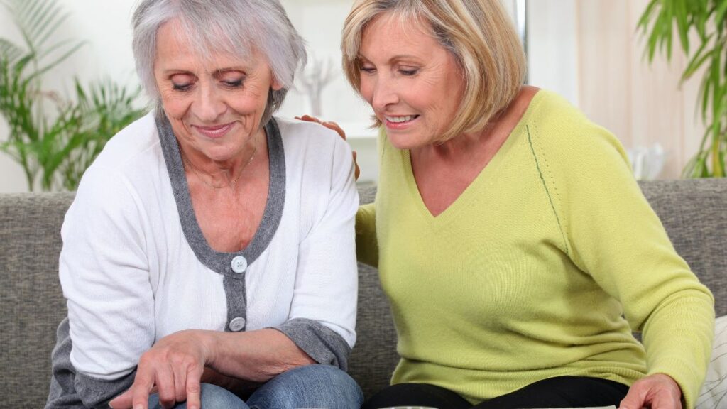 women looking at pictures