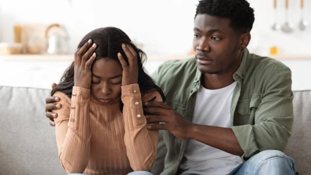 Man Comforting Woman