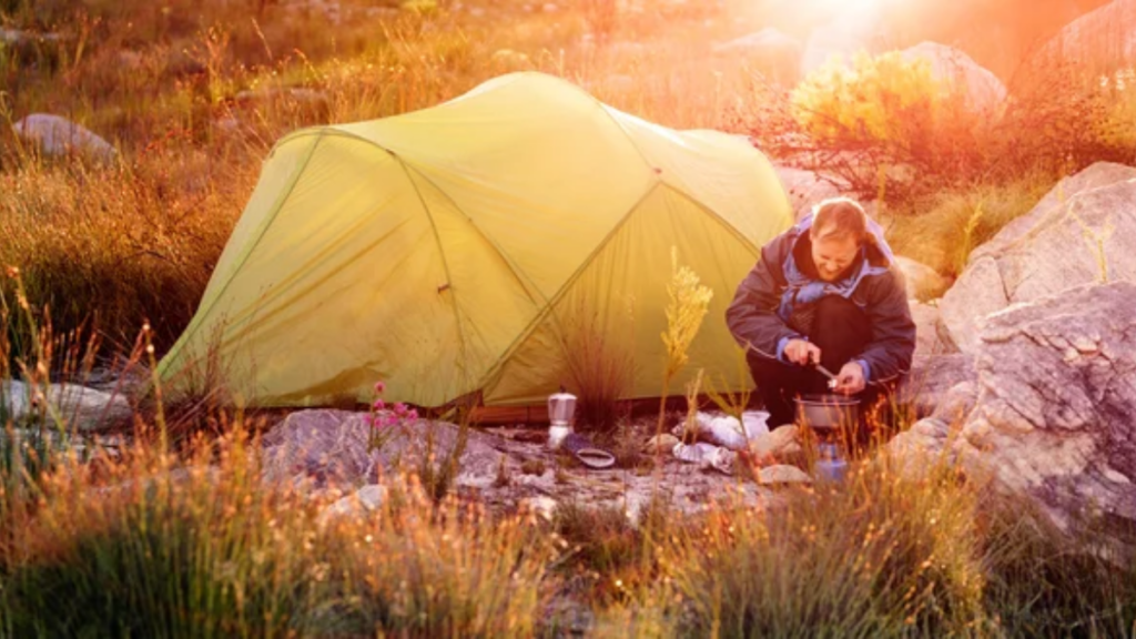 Man Tent Cooking