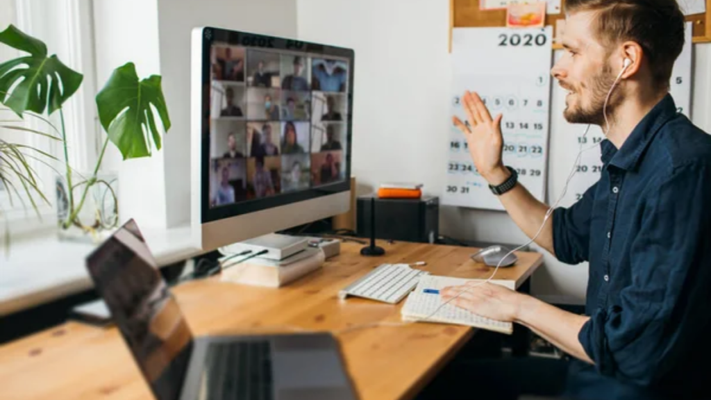 Man Work Home Computer Meeting Image Credit: Depositphotos/Girtss.