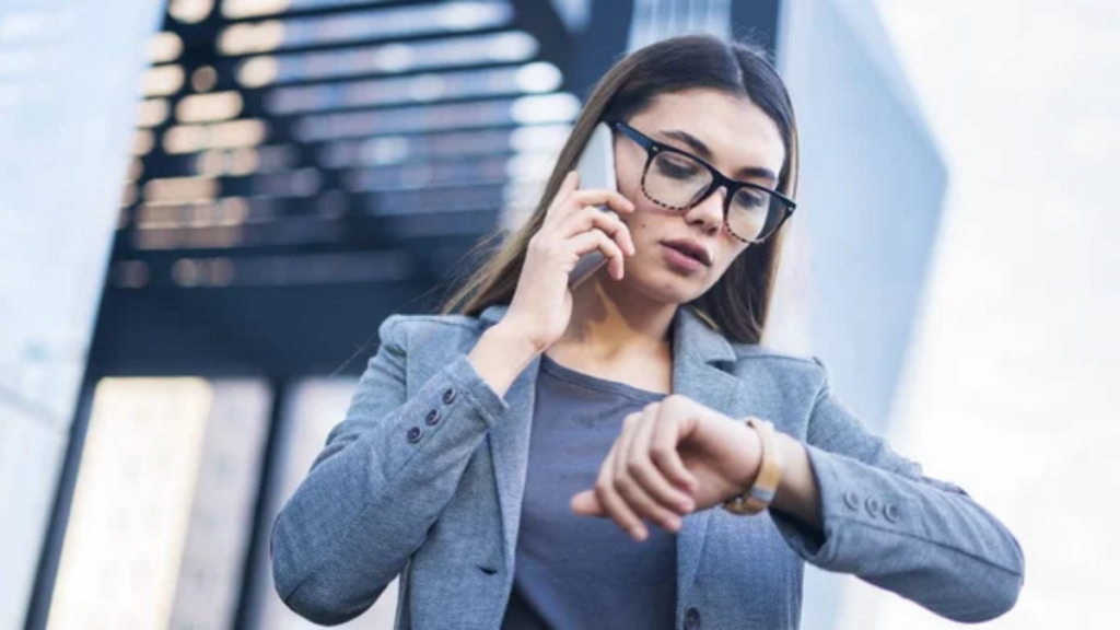 Woman Looking Watch Glasses