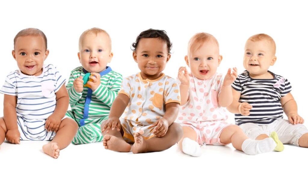 babies sitting in a line