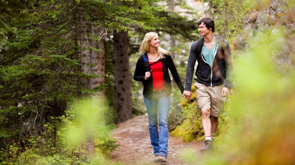 couple walking in the woods