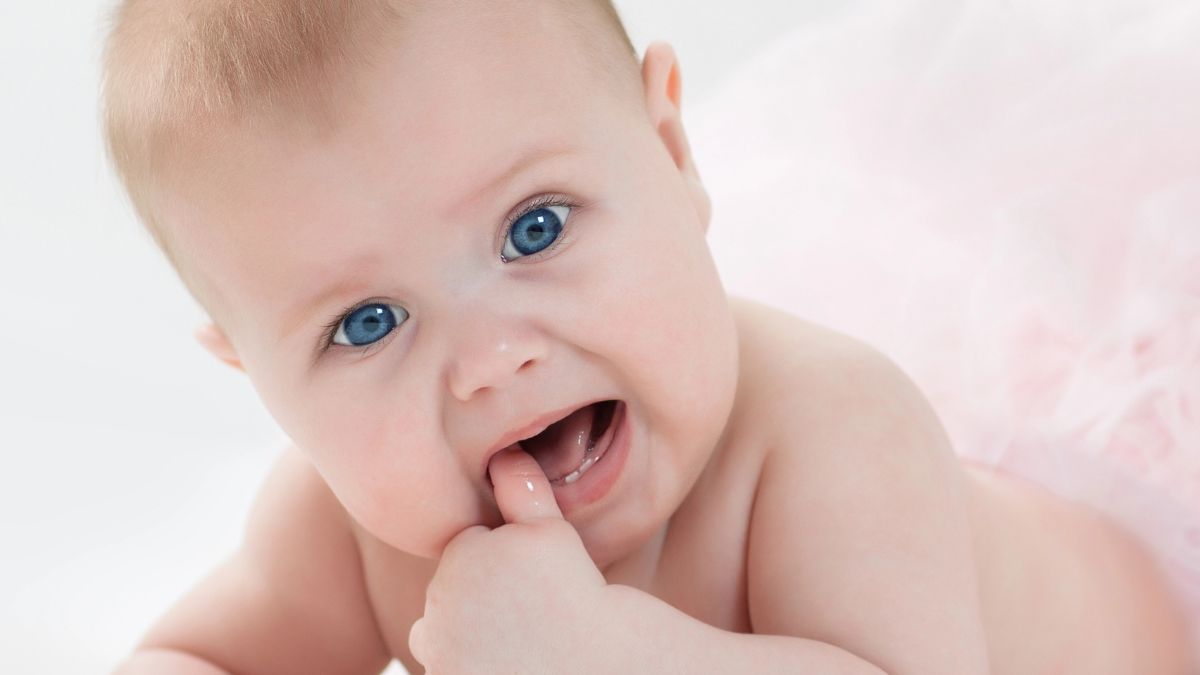 cute baby chewing finger