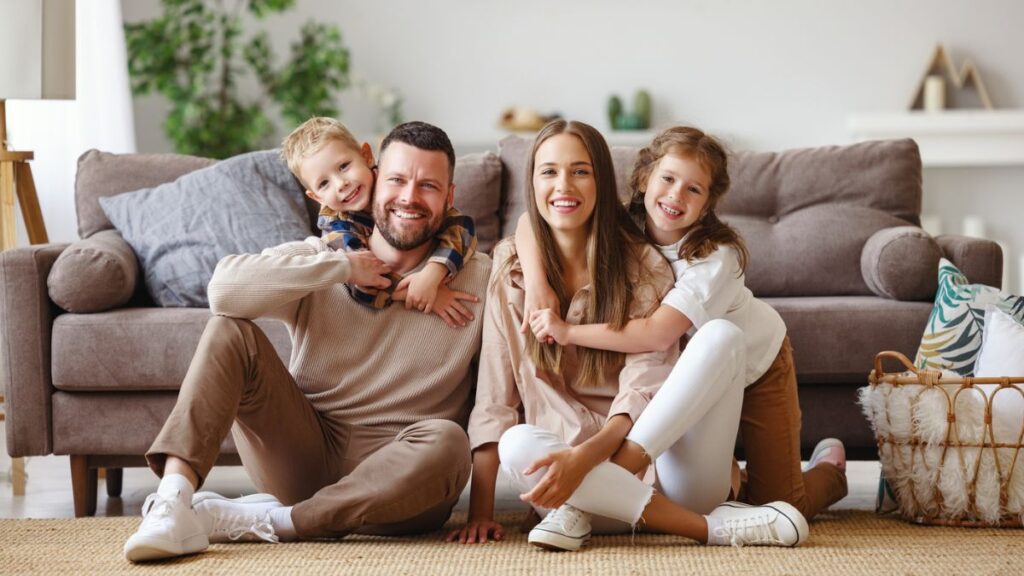 family sitting on the floor together