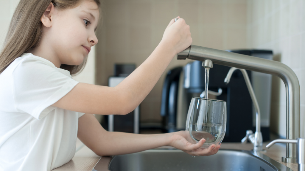 girl at sink