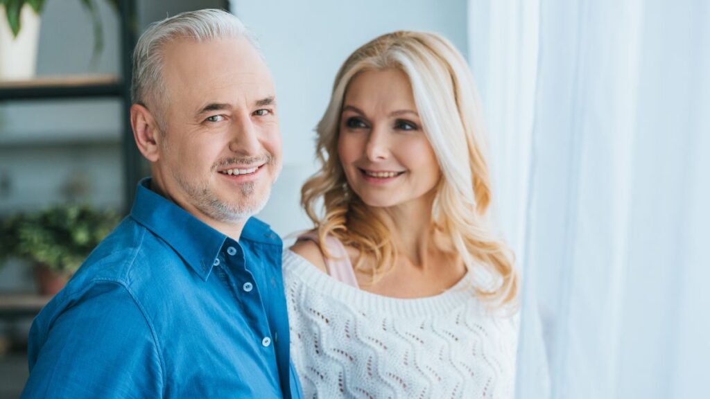 happy older couple standing together