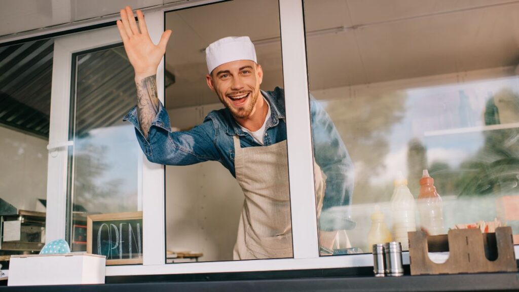 man working fast food window