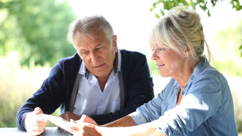 older couple using tablet