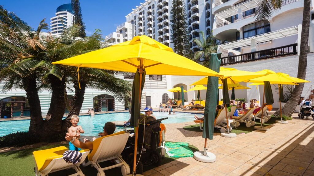 people by the pool at timeshare