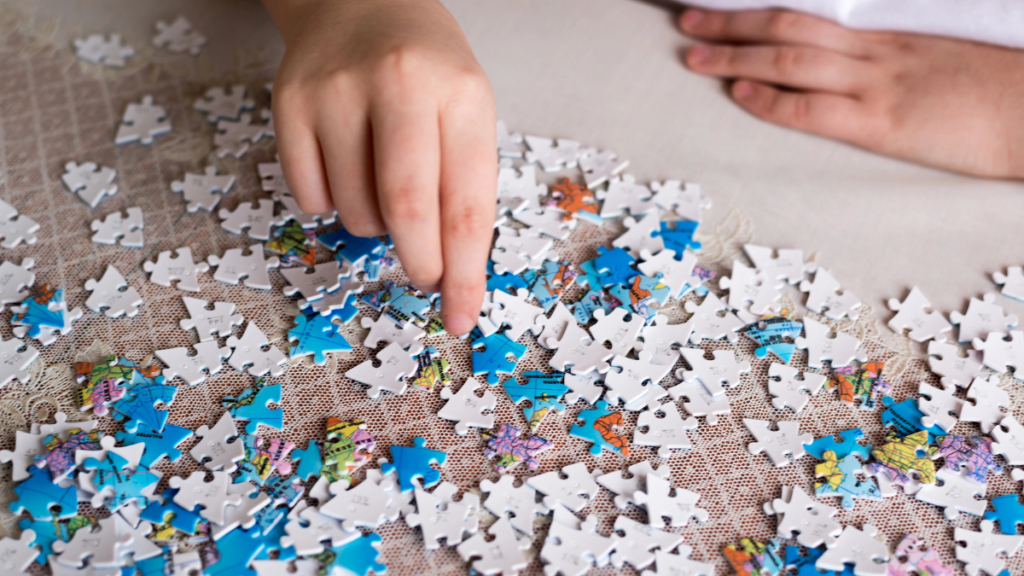 person doing puzzle