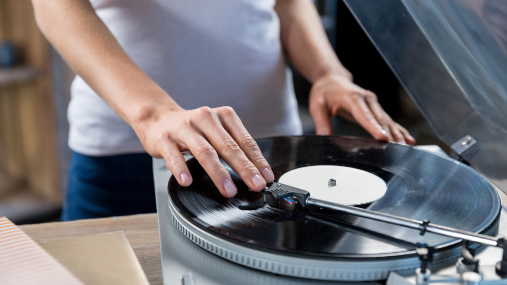 person with record player