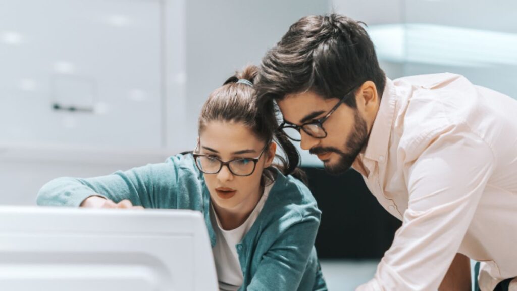 woman and man looking at a new appliance