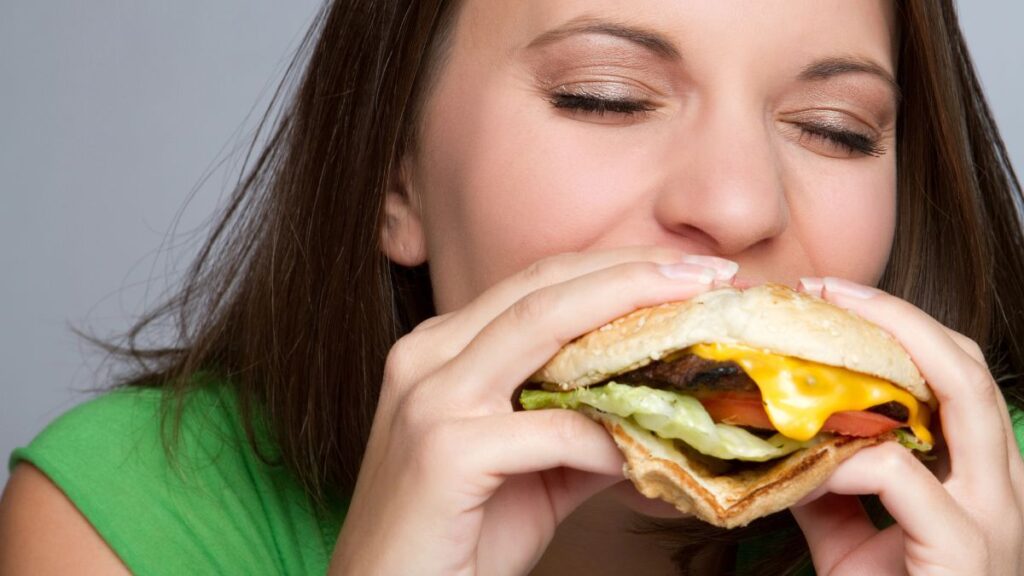 woman eating a burger