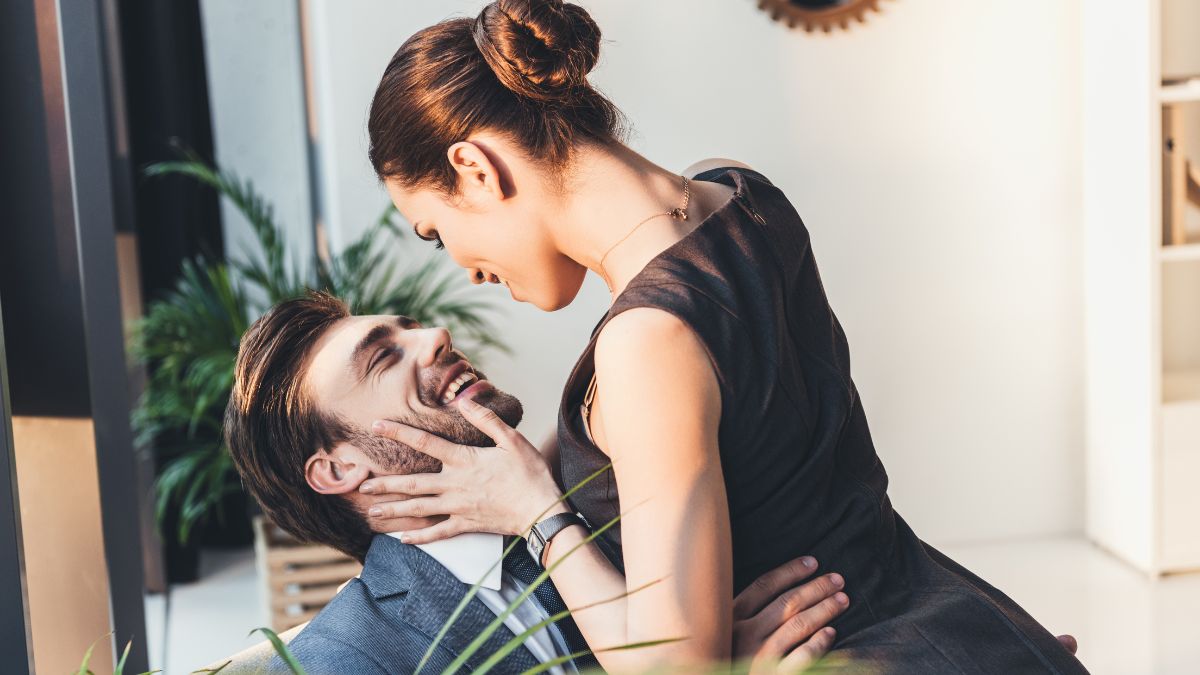 woman leaning on man almost kissing