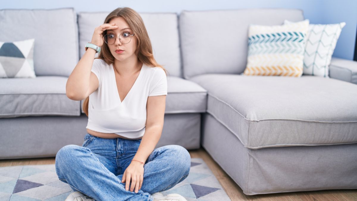 woman looking annoyed eyes wide open