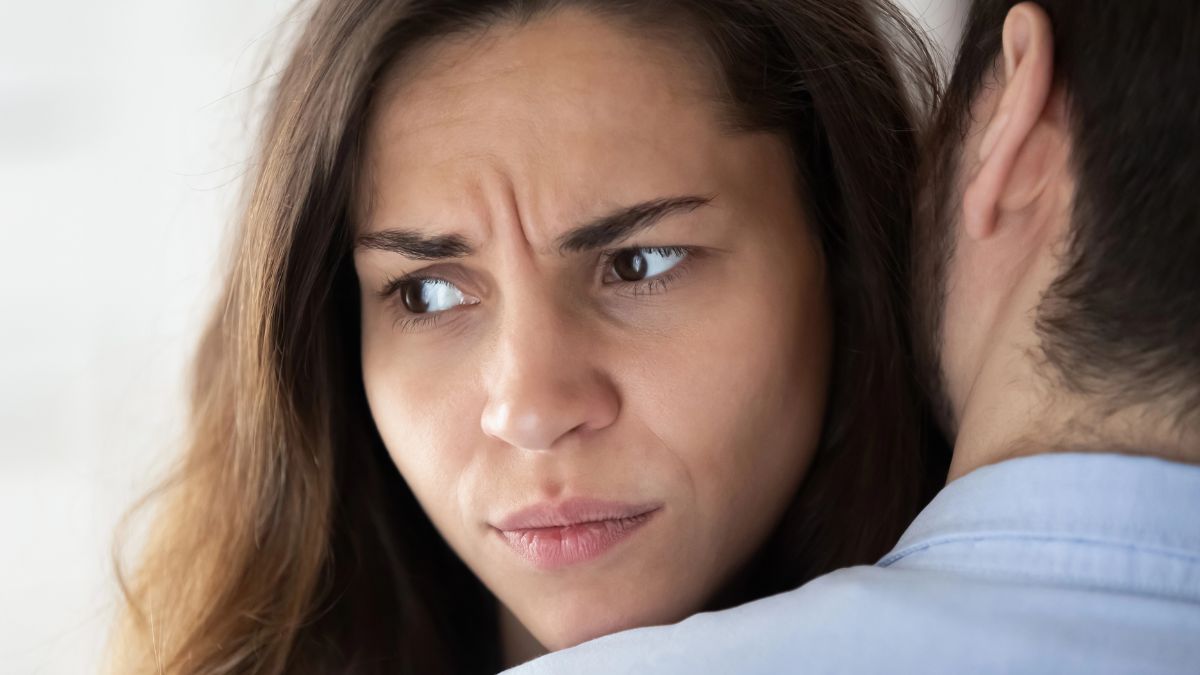 woman looking away uncaring