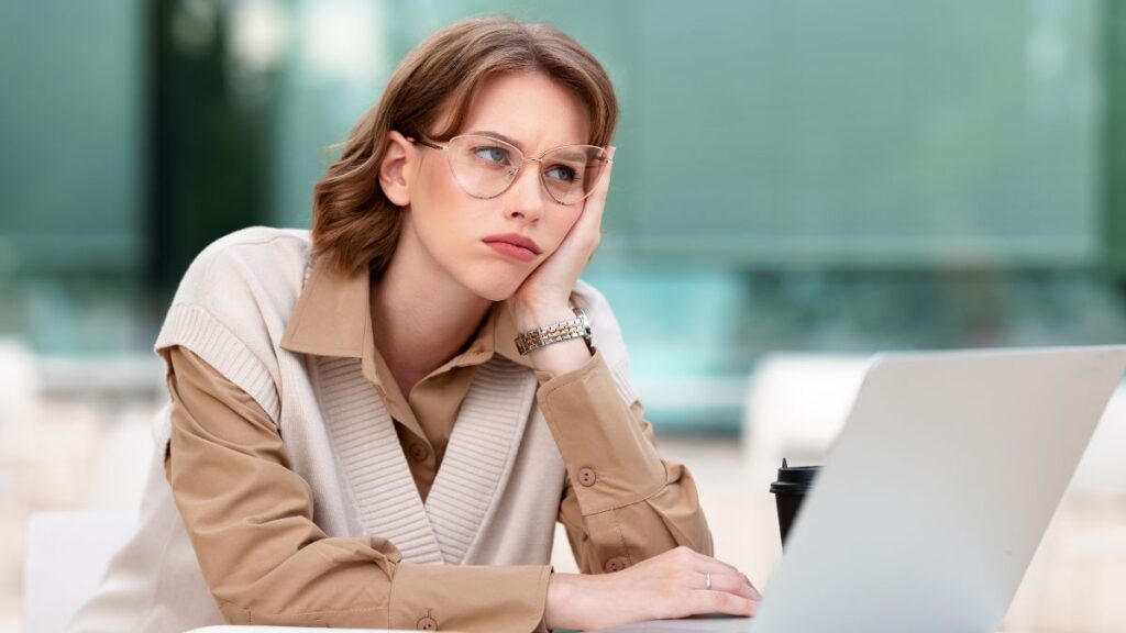 woman looking board at work