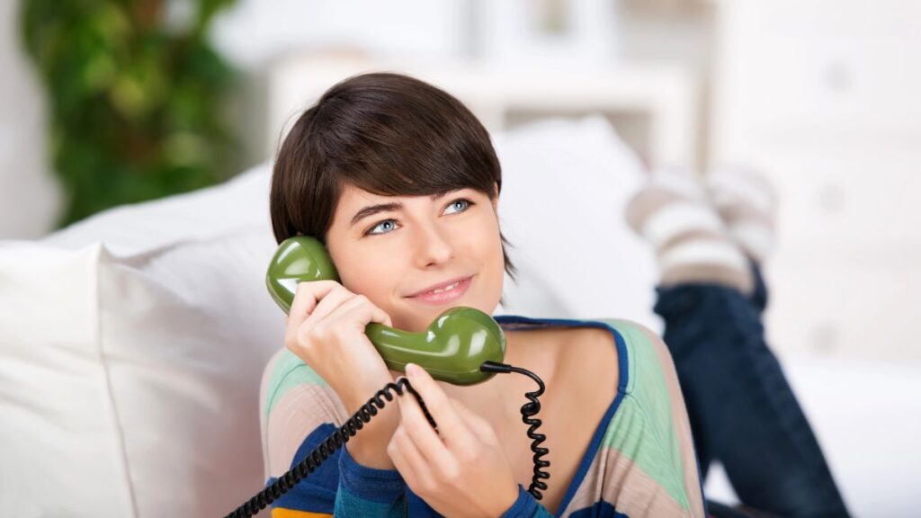 woman on landline phone