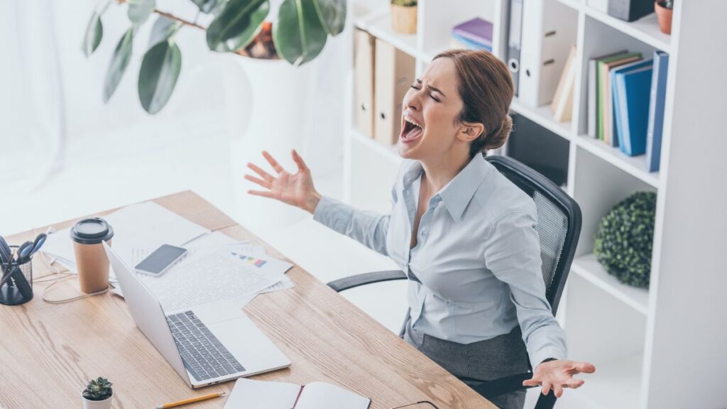 woman stressed at desk