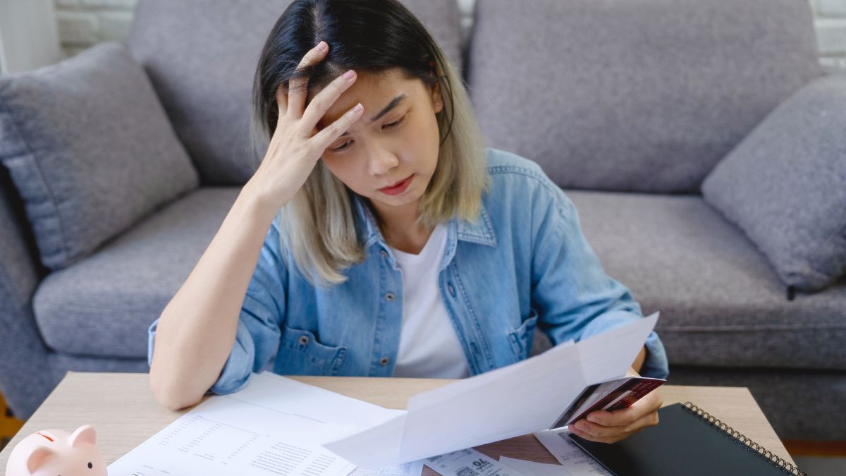 woman stressed over bills