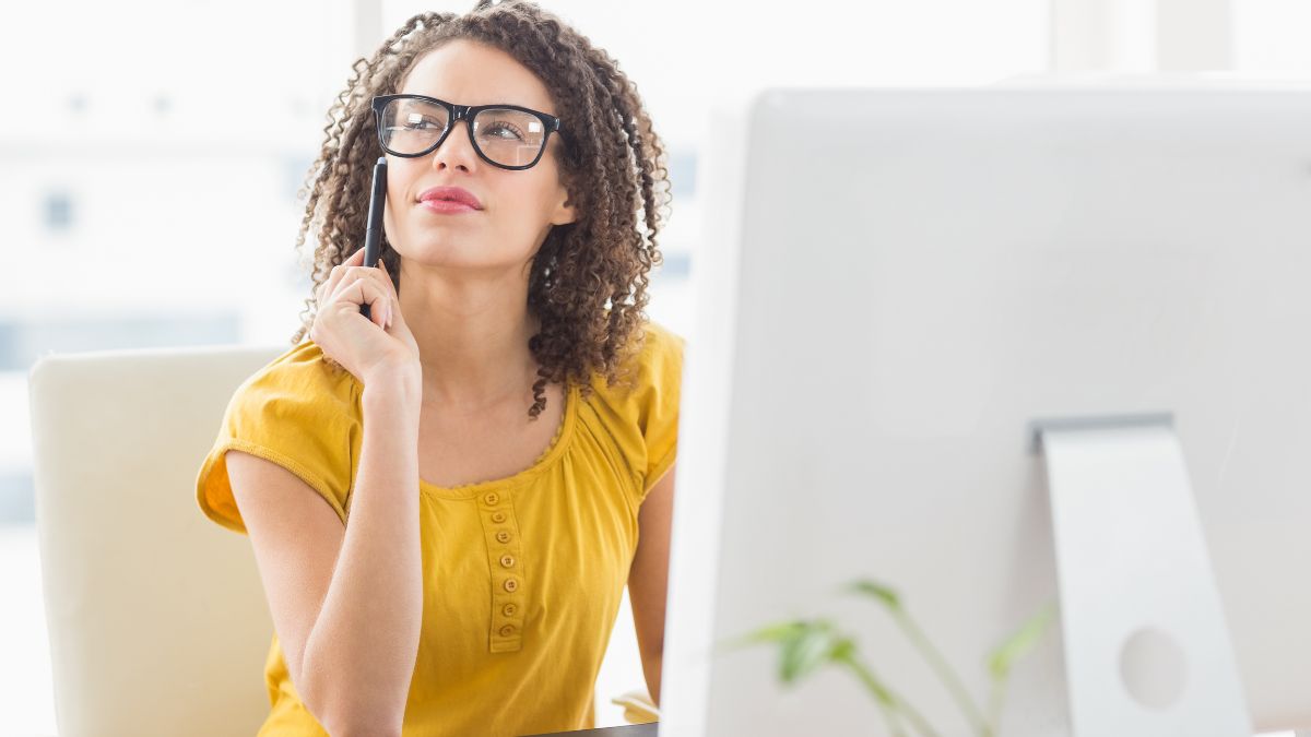 woman thinking at desk