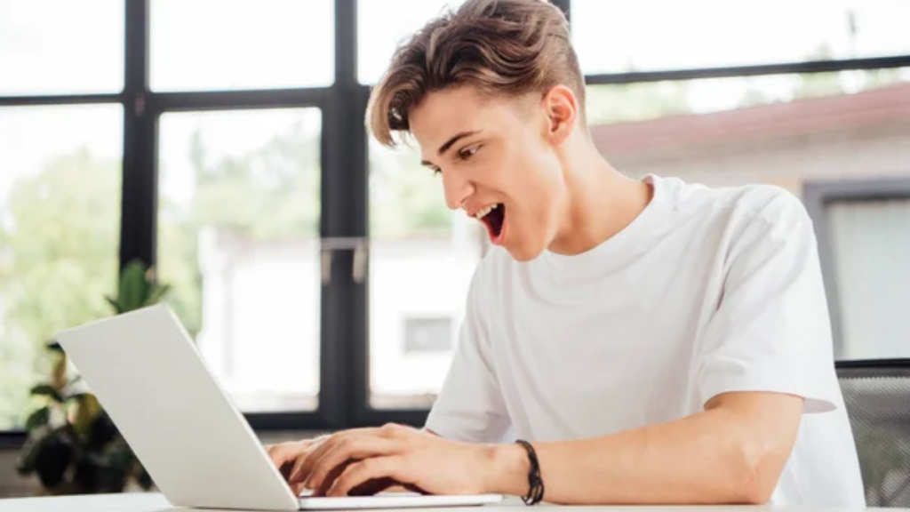 Excited Teen Computer