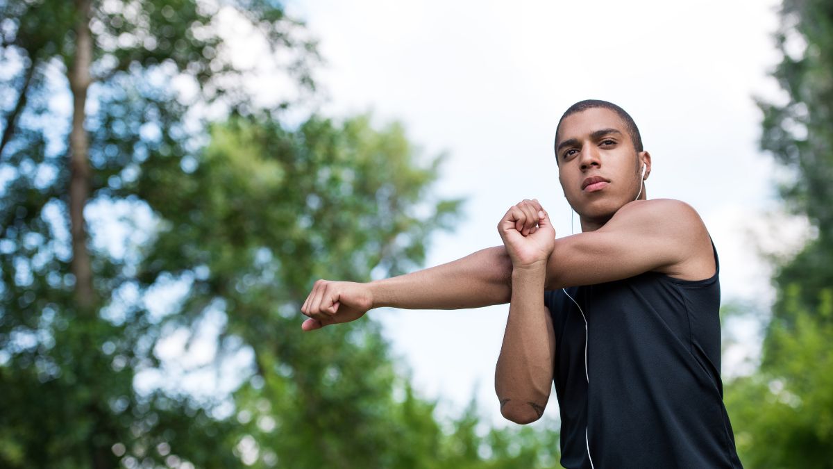 Man stretching arm