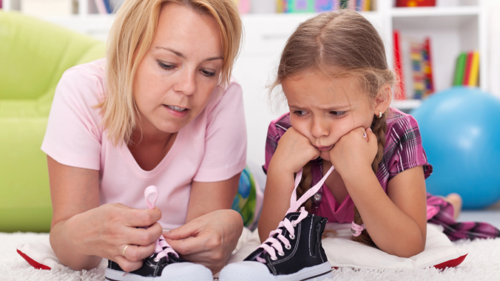 Mother Daughter Child Tying Shoes