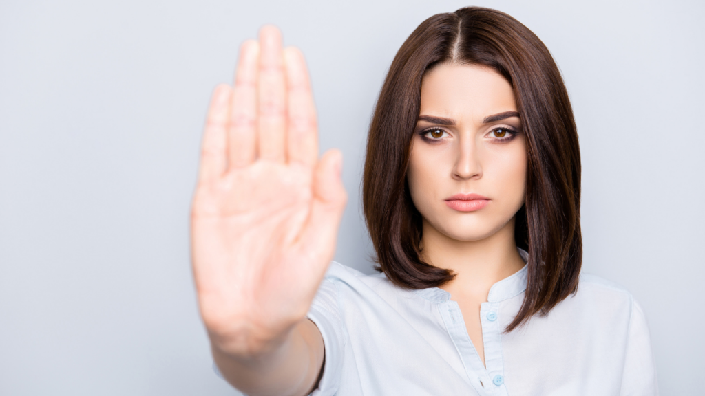 Woman Hand Up Saying NO