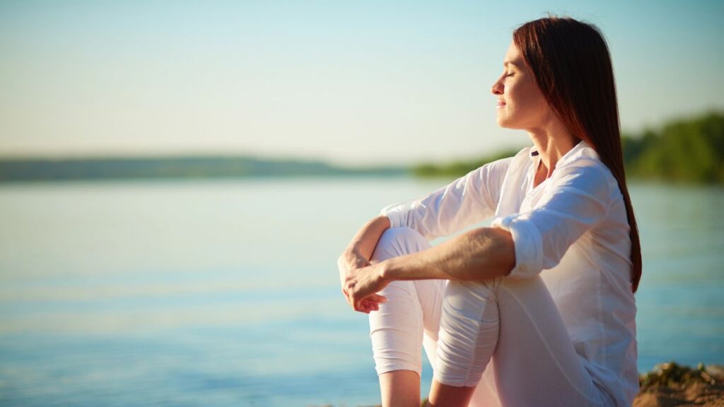 Woman meditating Image Credit Depositphotos pressmaster.