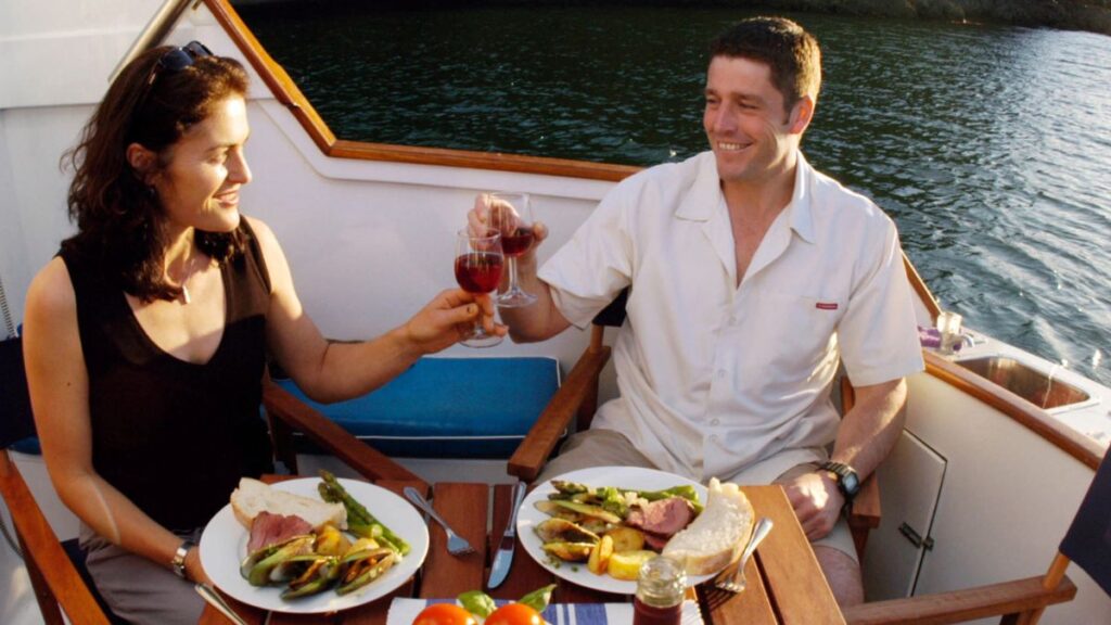 couple eating on a boat