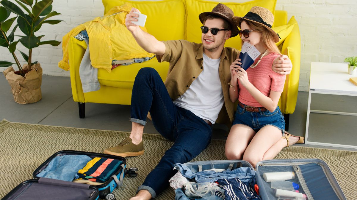 couple taking selfie packing